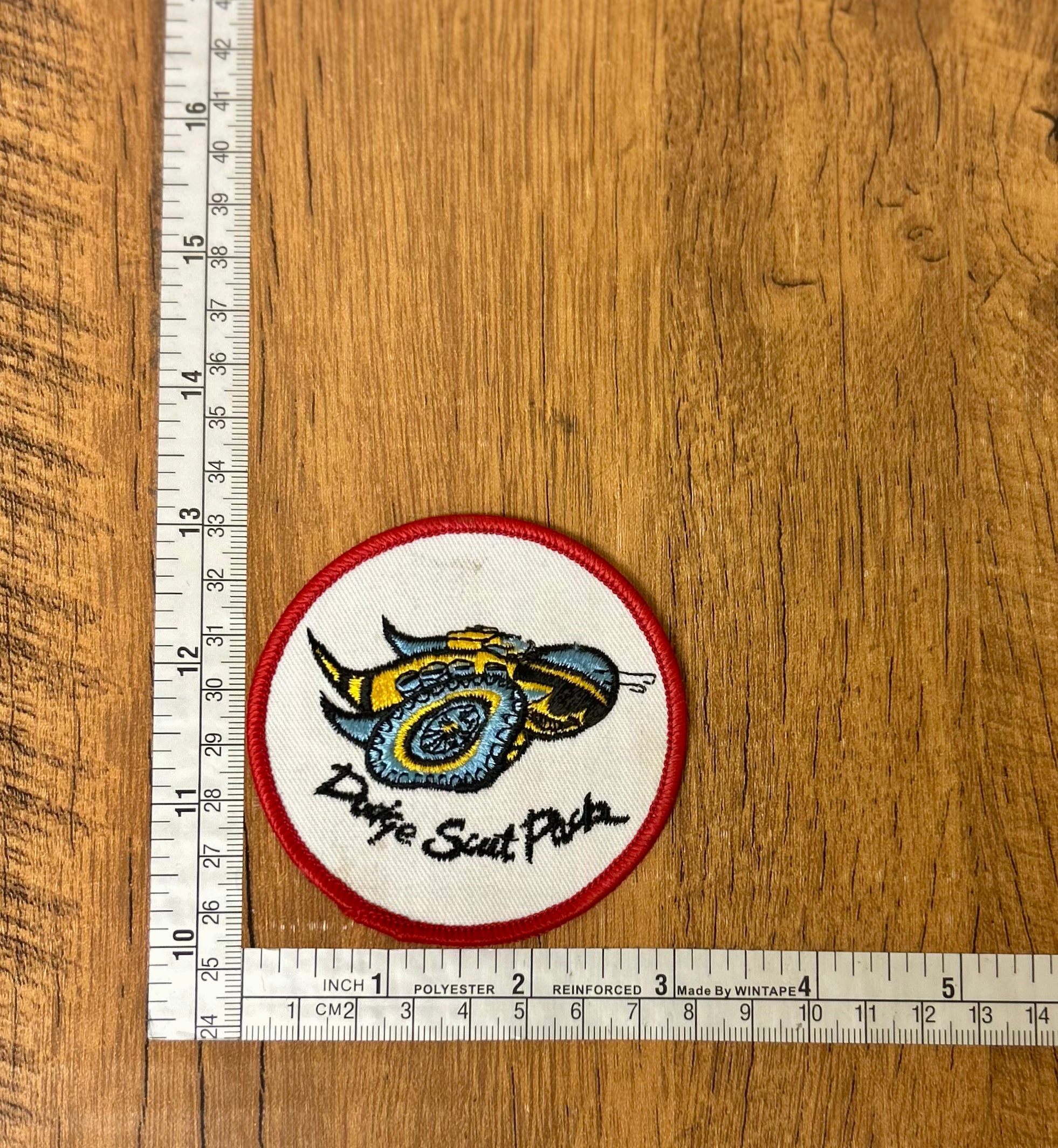 Dodge patch by The Mad Hatter Company featuring detailed embroidered design on fabric for sewing or decorating clothing.