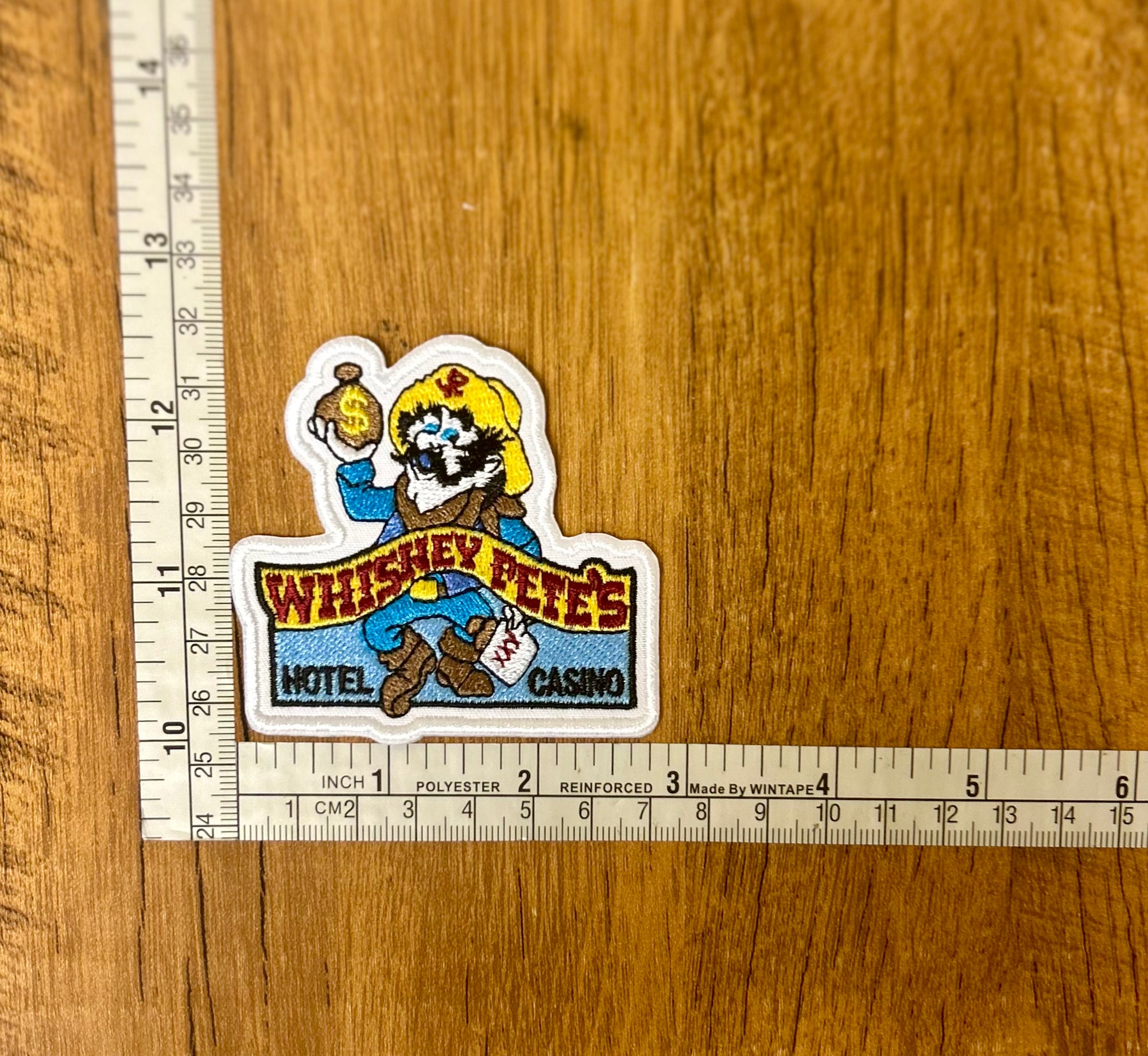 Whiskey Pete's patch by The Mad Hatter Company featuring a vintage-style design on fabric patch.