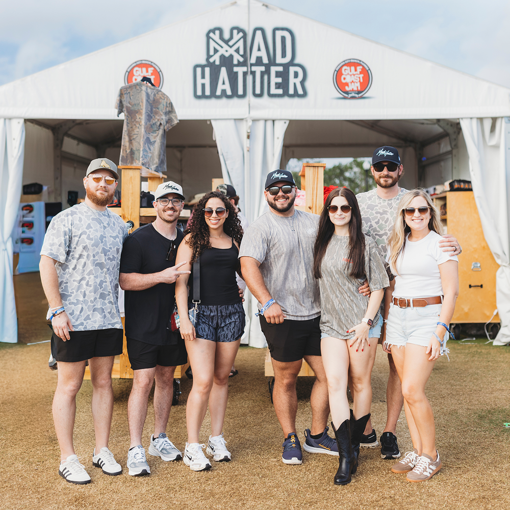 Mad Hatter Co. team at the brand's Gulf Coast Jam festival booth