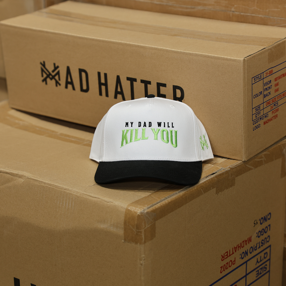 My Dad Will Kill You trucker hat on Mad Hatter Co. shipping boxes