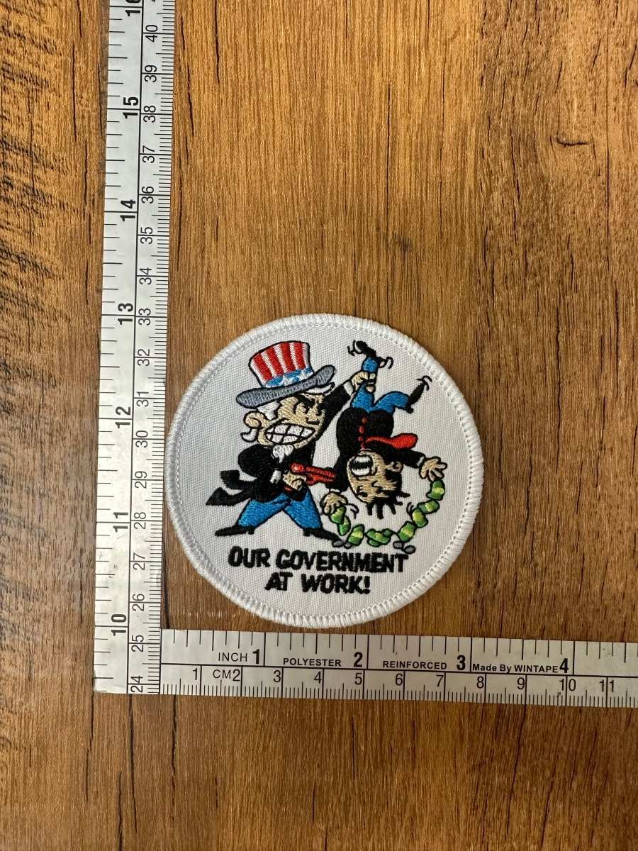 Our Government At Work - The Mad Hatter Company