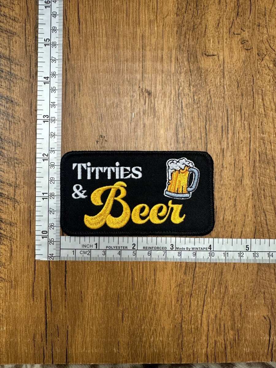 Titties & Beer - The Mad Hatter Company
