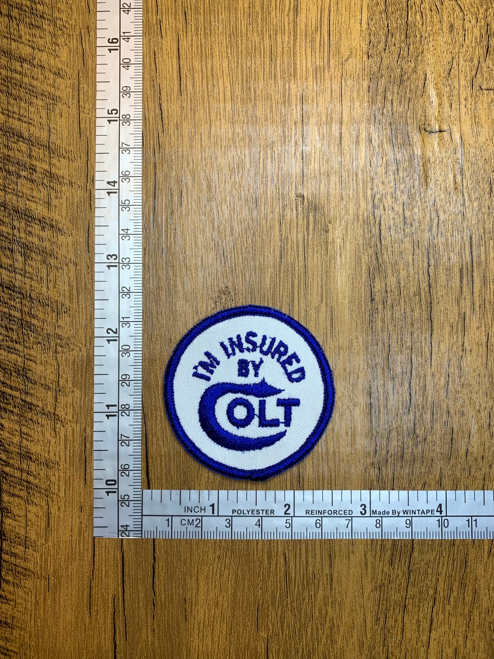 Vintage I’m Insured by Colt