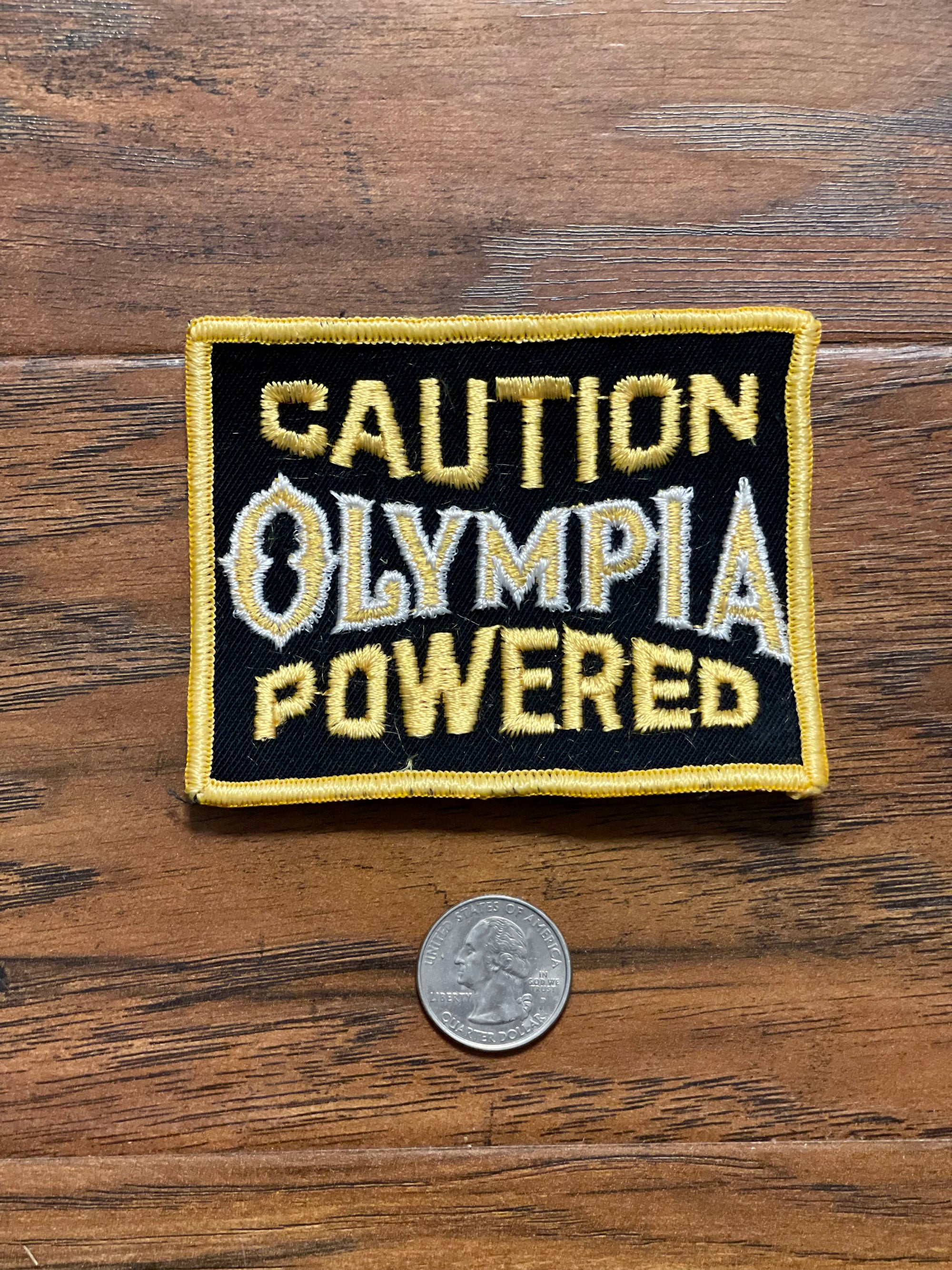 Vintage Caution Olympia Powered