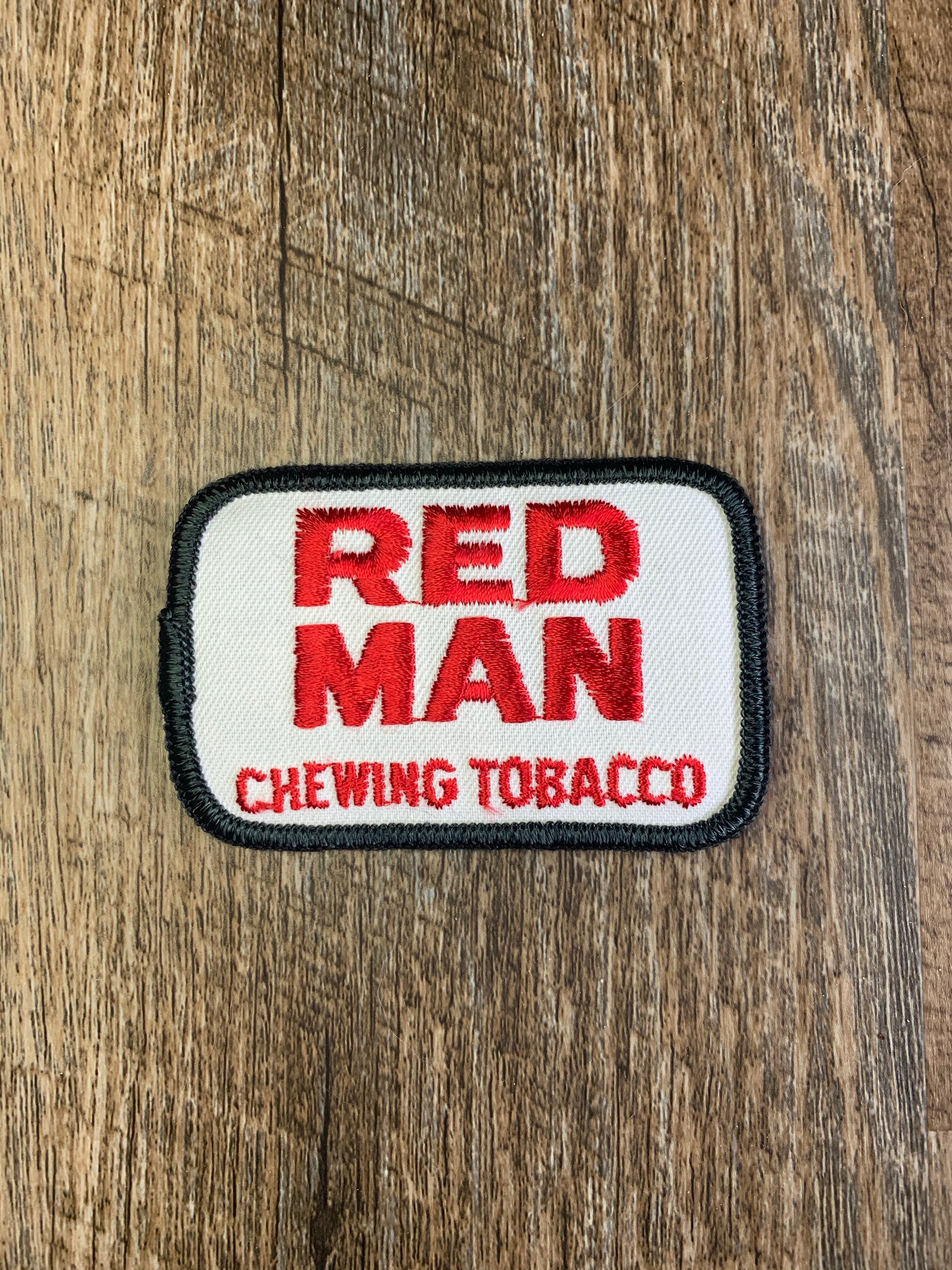 red man chewing tobacco logo