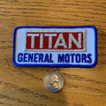 Titan General Motors - The Mad Hatter Company