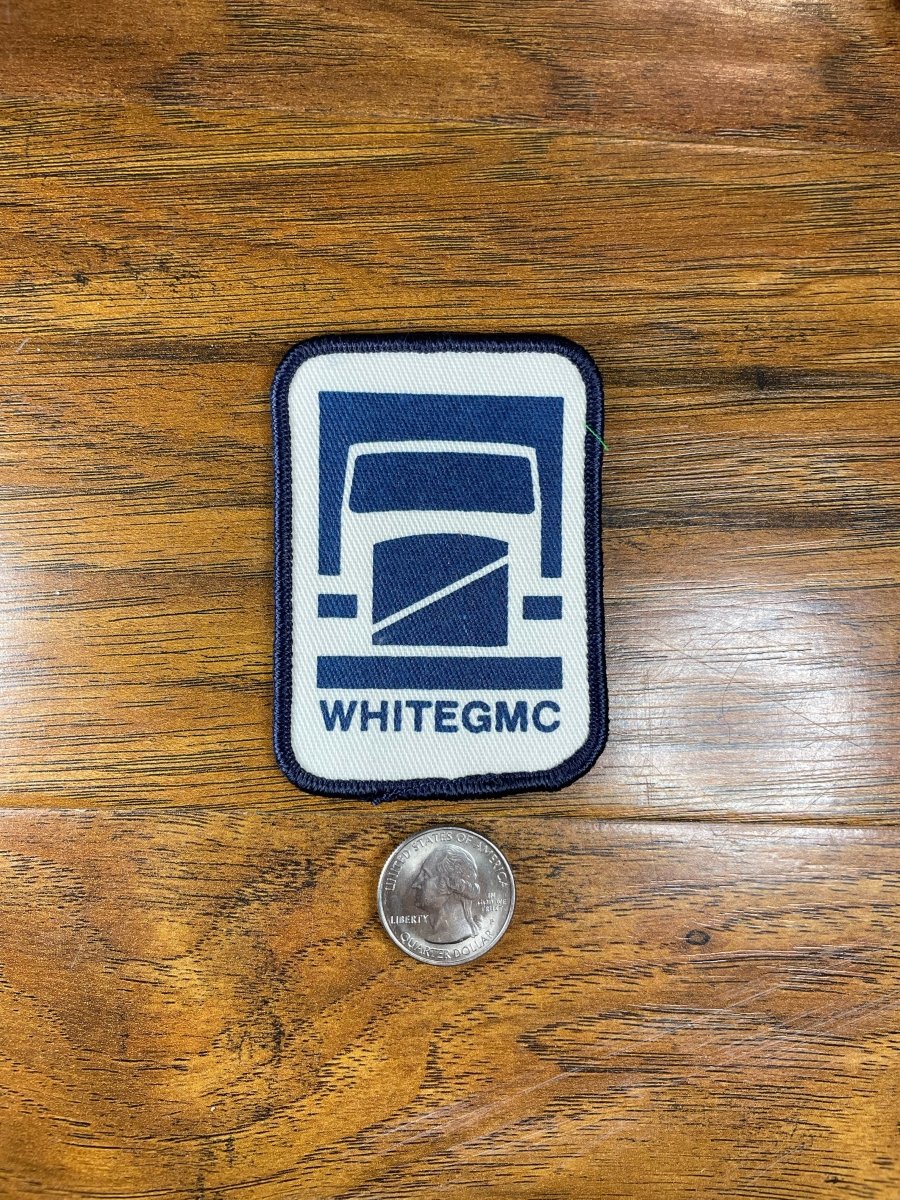 White GMC - The Mad Hatter Company